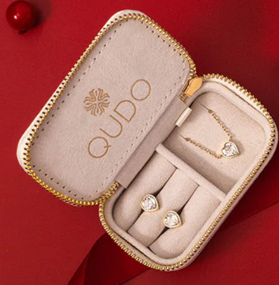 Heart shaped Earrings with matching pendant in gold in a beautiful jewellery box